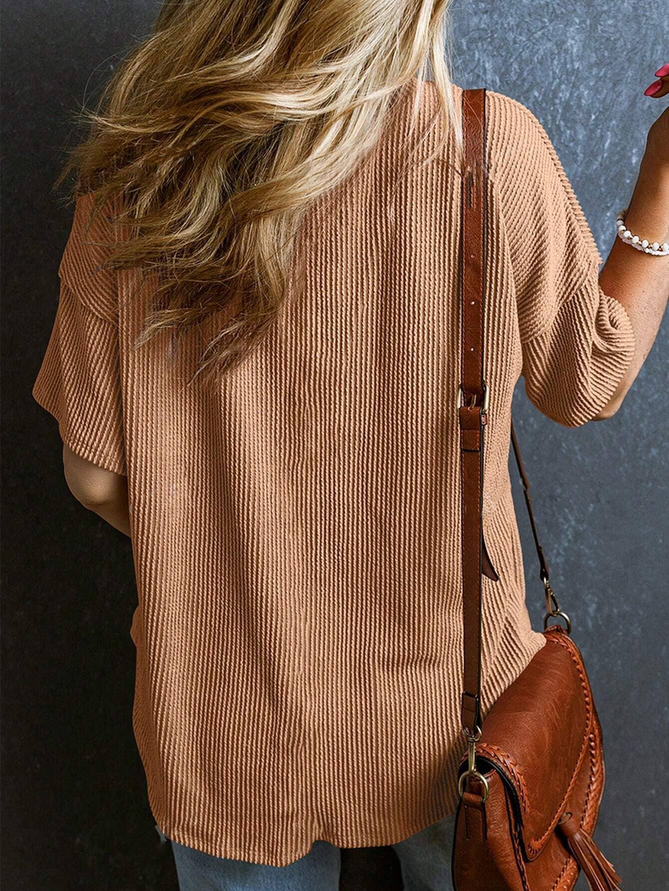 Stylish two-tone twist bullet pocket V-neck top